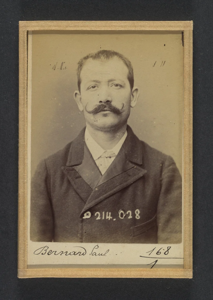 Bernard. Paul, Auguste. 32 ans, né à Crest (Drôme). Employé. Excitation au meurtre, anarchiste. 11/2/94. by Alphonse Bertillon, photograph, 1894