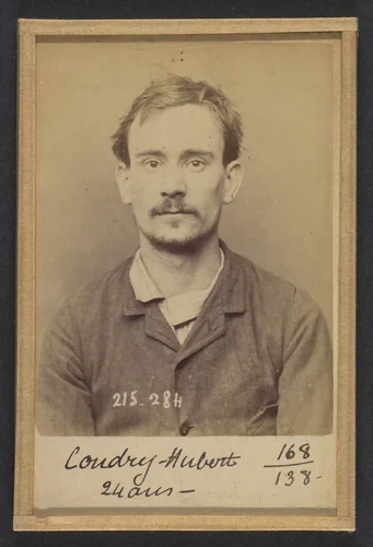 Coudry. Hubert, Louis. 24 ans, né à Paris XVe. Corroyeur. Anarchiste. 7/3/94. by Alphonse Bertillon, photograph, 1894