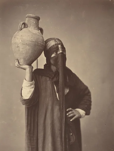 Porteuse d'eau au Caire [Water Carrier in Cairo] by Félix Bonfils, photograph, 1865-1875