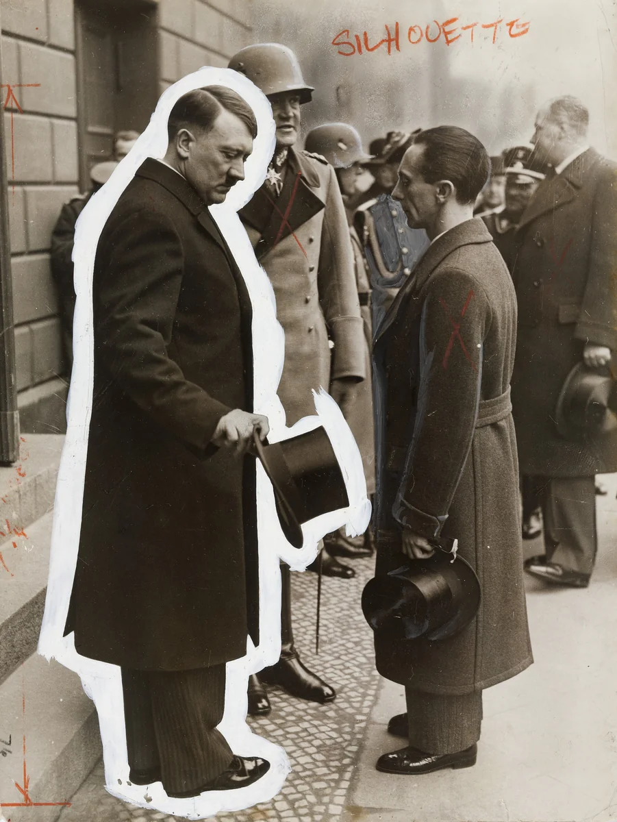 "Chancellor Adolf Hilter Engaged in Earnest Conversation with Dr. Goebbles" by Times Wide World Photos, photograph, 1934