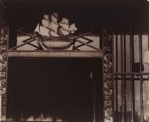 Au Petit Dunkerque, 3 quai Conti by Eugène Atget, photograph, 1900