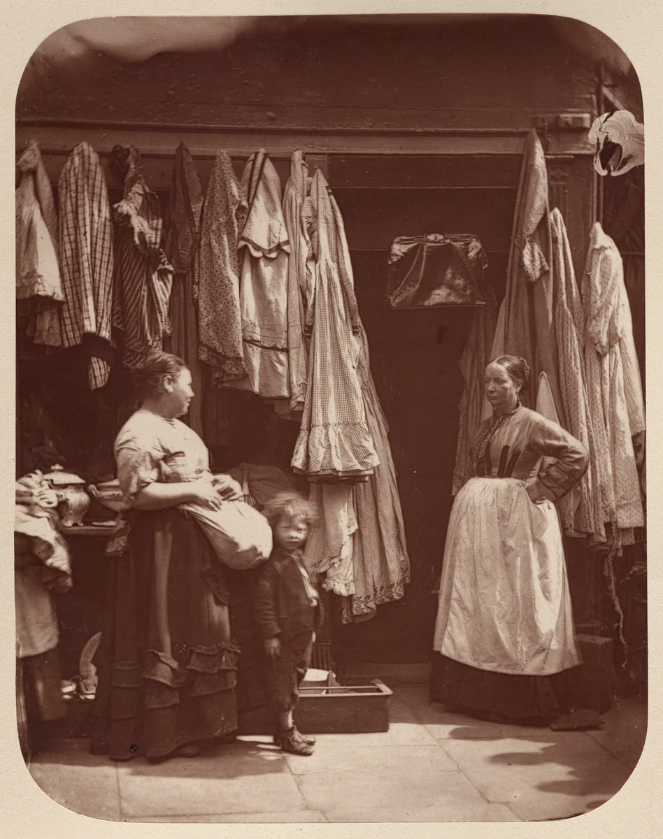 An Old Clothes Shop, Seven Dials by John Thomson, photograph, 1877