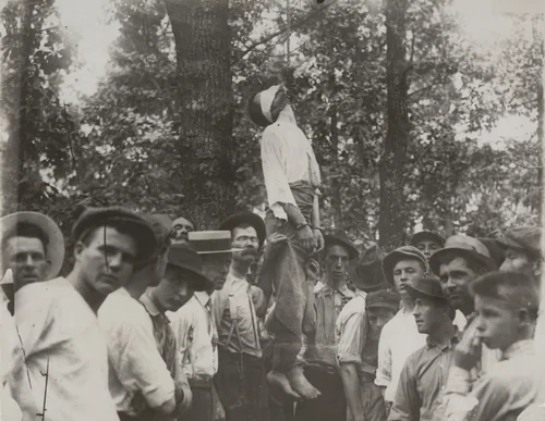 Leo Frank's Body Hanging to a Tree at Marletta, Georgia, After He Had Been Lynched by Times Wide World Photos, photograph, 1915