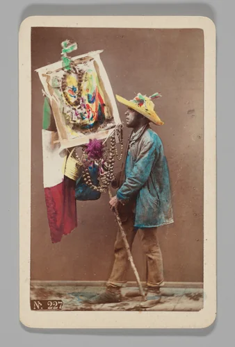 [Studio Portrait: Man Holding Decorative Stick with Italian Flag, Naples] by Giorgio Conrad, photograph, 1860-1879