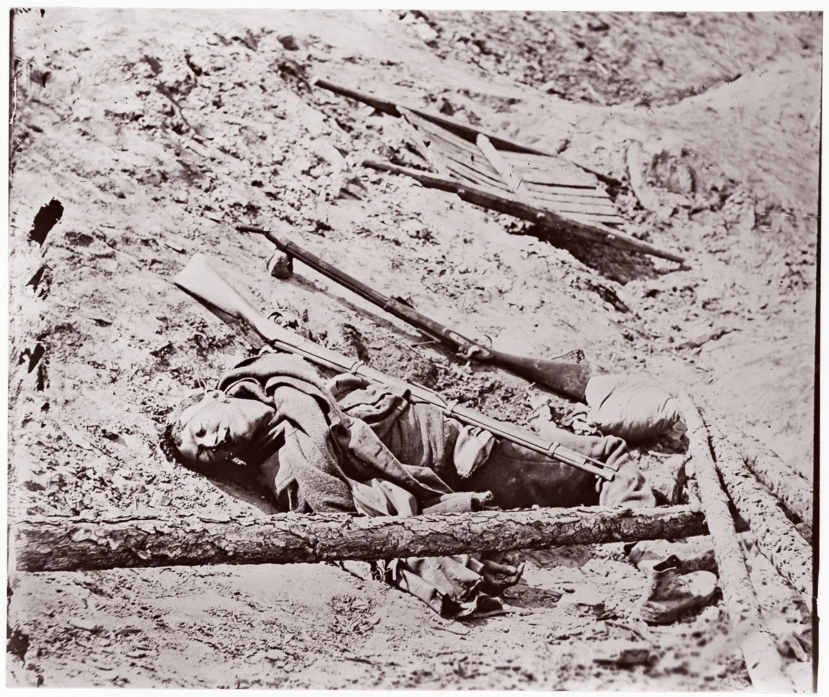 Dead Confederate Soldier at Fort Mahone, Petersburg by Thomas C. Roche, photograph, 1864