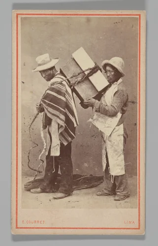 [Studio Portrait: Two Men, one with Box Tied to his Back, Lima] by Eugenio Courret, photograph, 1860-1879