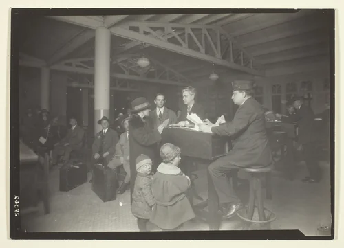 German Family, Interpreter and Recorder at Ellis Island by Lewis Wickes Hine, photograph, 1926