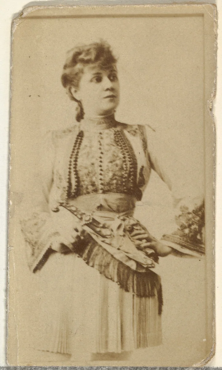 [Actress wearing fringed scarf], from the Actors and Actresses series (N145-8) issued by Duke Sons & Co. to promote Duke Cigarettes by W. Duke, Sons & Co., photograph, 1890-1895