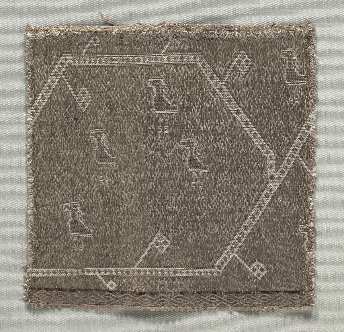 Fragment of a Chasuble Orphrey Cross Band by Unknown, textile, 1000-1099