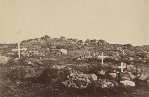 "An Esquimaux burial ground. The crosses have been placed here by some of the whalers, who had lost some one of their number." by George P. Critcherson, John L. Dunmore, William Bradford, photograph, 1869
