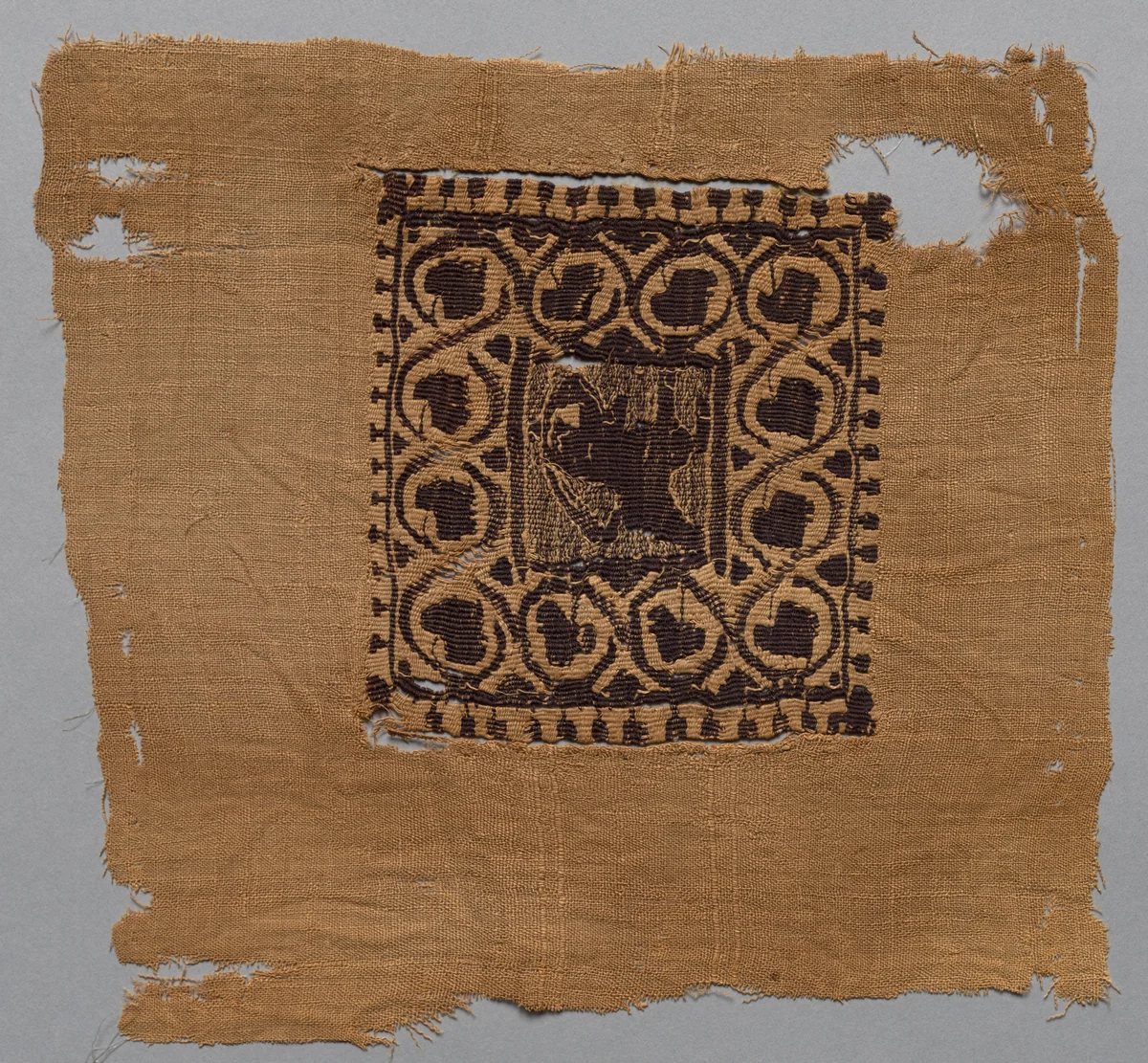 Fragment, with Segmentum, from a Tunic by Unknown, textile, 500-599