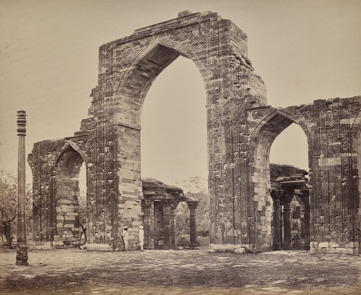 Delhi. Great Arch and Iron Pillar Near the Kootub Minar, Ruin of Old Delhi by Samuel Bourne, photograph, 1863-1870