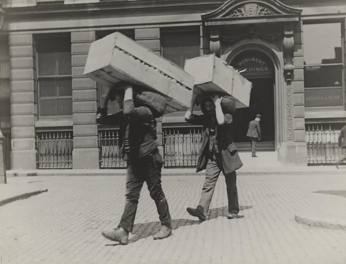 Market Porters Carrying Boxes of Oranges by Paul Martin, photograph, 1894