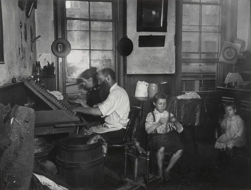 Bohemian Cigarmakers at Work in Their Tenement by Jacob August Riis, photograph, 1889