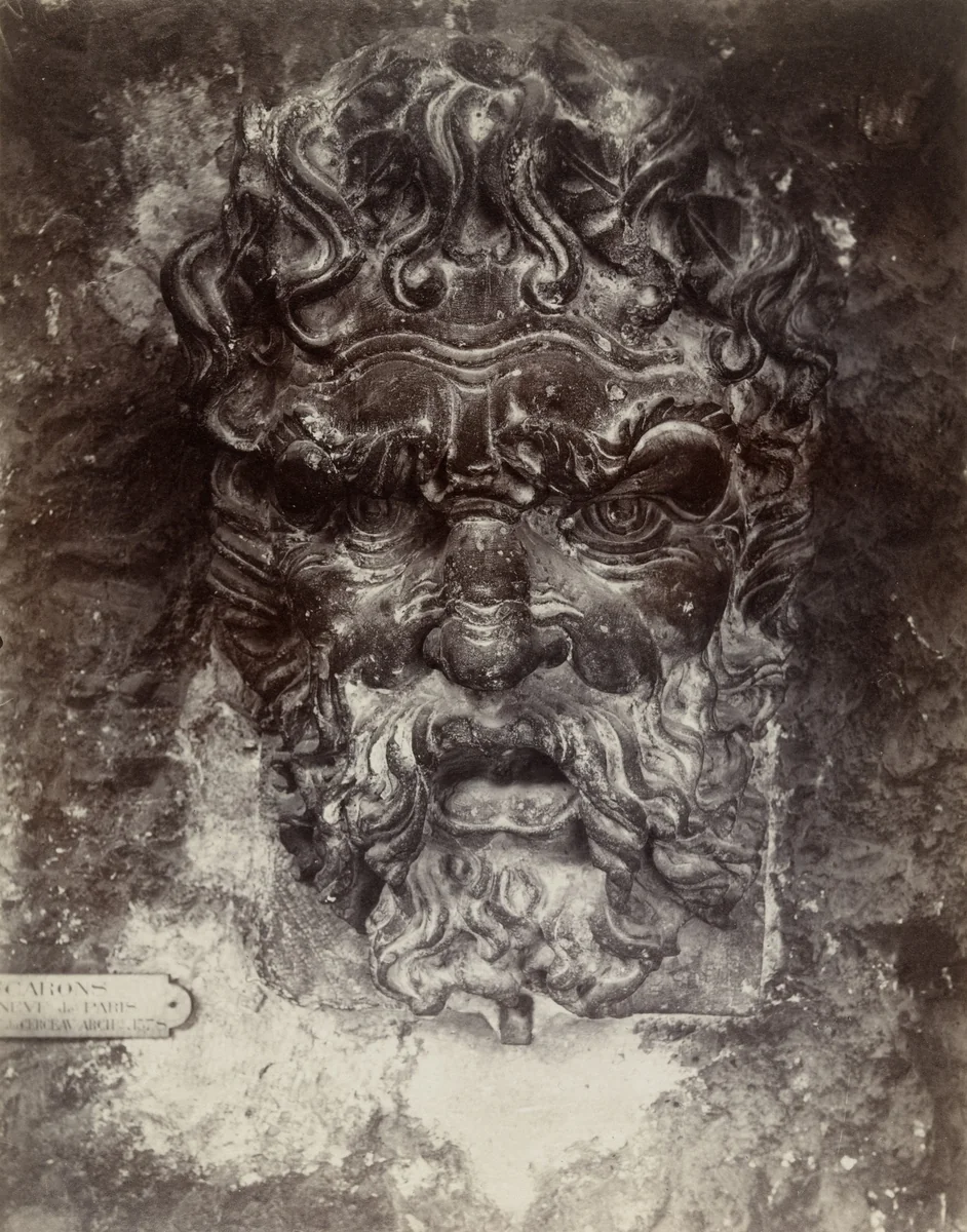 Cluny. Mascarons au Pont-Neuf by Eugène Atget, photograph, 1911