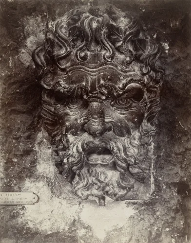 Cluny. Mascarons au Pont-Neuf by Eugène Atget, photograph, 1911