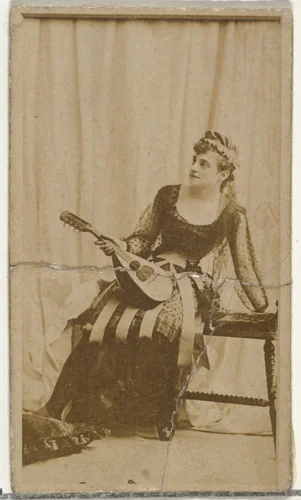 [Actress holding mandolin], from the Actors and Actresses series (N145-8) issued by Duke Sons & Co. to promote Duke Cigarettes by W. Duke, Sons & Co., photograph, 1890-1895