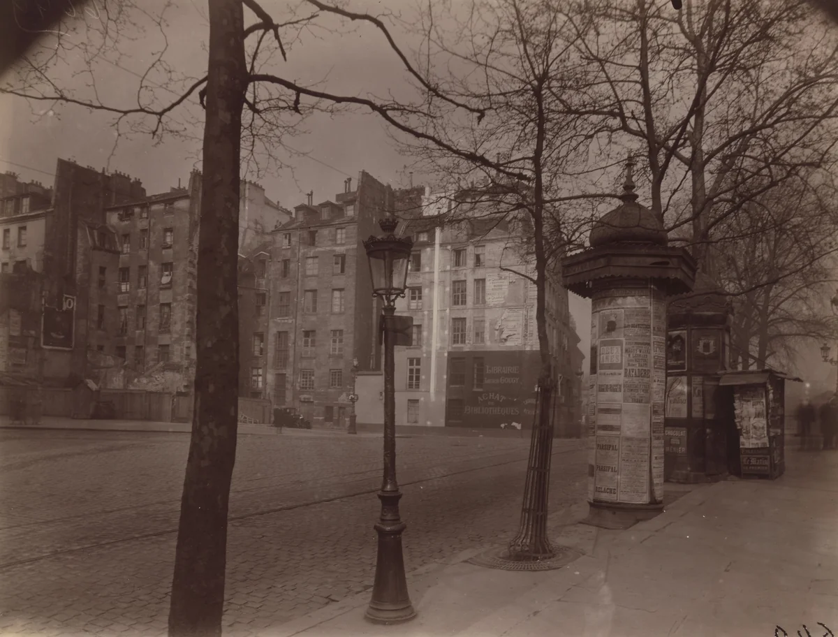 Coin du quai Voltaire et rue de Nevers by Eugène Atget, photograph, 1926