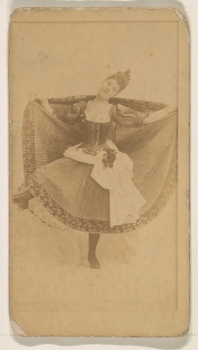 Dancer holding skirt, from the Actresses series (N245) issued by Kinney Brothers to promote Sweet Caporal Cigarettes by Kinney Brothers Tobacco Company, photograph, 1890