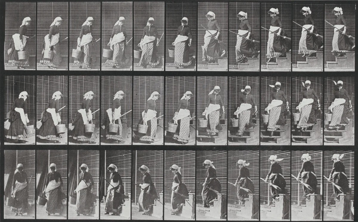 Plate Number 148. Descending stairs, turning carrying a bucket of water and a broom by Eadweard Muybridge, photograph, 1887