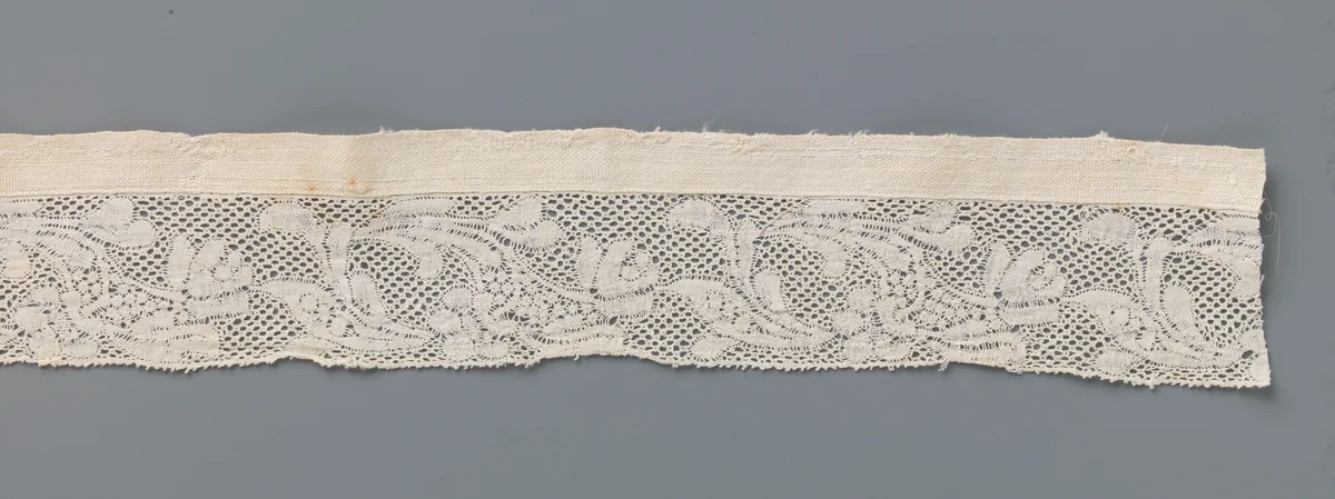 Tussenzetsel van kloskant met twee verschillende soorten bloemen aan een zich splitsende steel by anonymous, book, 1750-1799