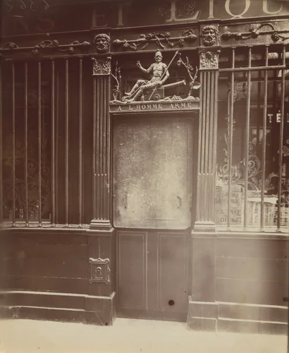 À l'homme Armé. 25 Rue des Blancs Manteaux by Eugène Atget, photograph, 1922