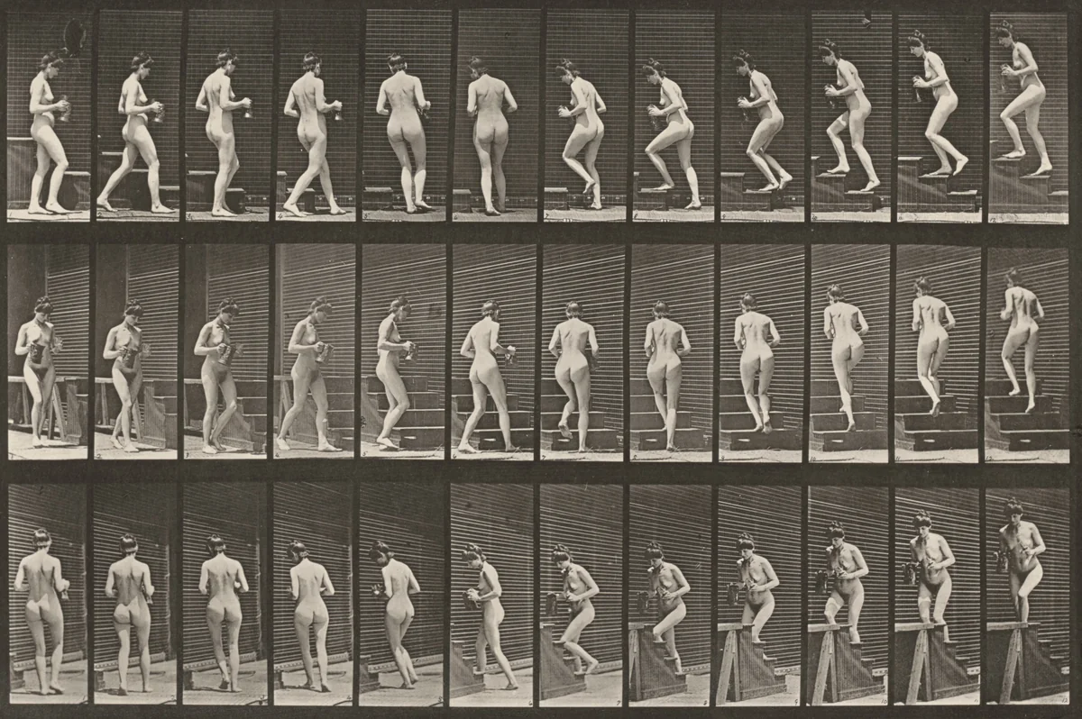Plate Number 103. Turning and ascending stairs with a pitcher and goblet in hands by Eadweard Muybridge, photograph, 1887