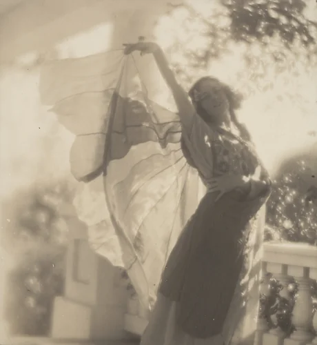 Violet Romer. (standing on porch, lifting veil) by Edward Weston, photograph, 1917
