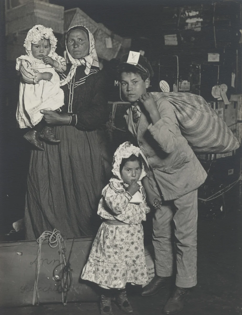 Italian Family Looking for Lost Baggage, Ellis Island, New York by Lewis Wickes Hine, photograph, 1905