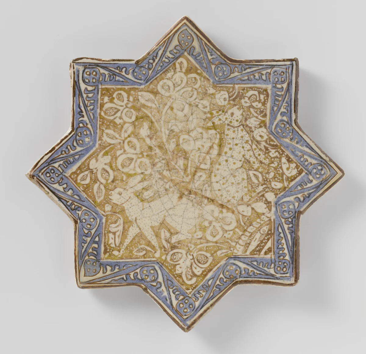 Star-shaped tile with hares among floral scrolls by anonymous, ceramic, 1250-1324