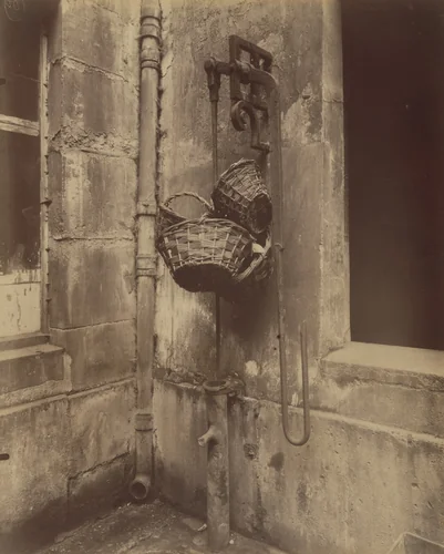 Fontaine du passage, 6 rue des Guillemites by Eugène Atget, photograph, 1911