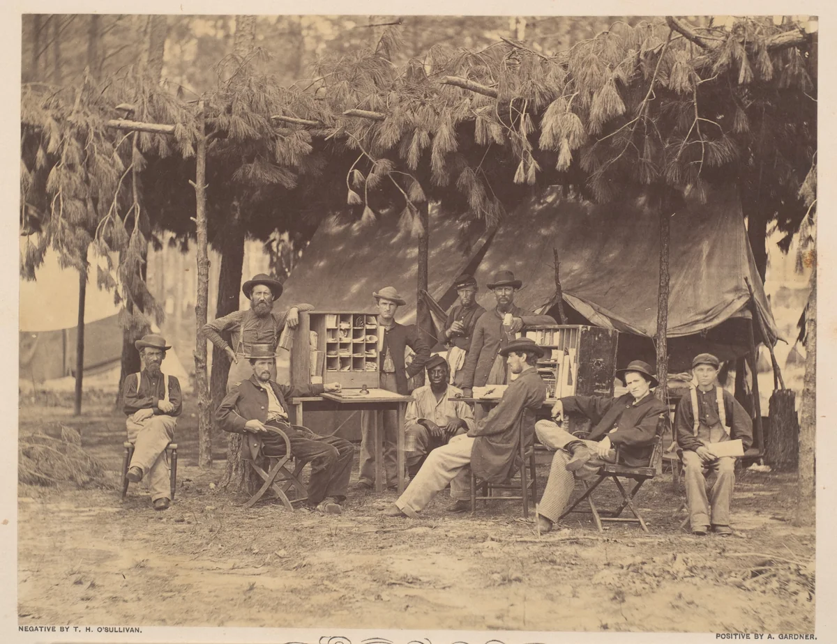 Chief Officer and Clerks of the Ambulance Department, 9th Army Corps, in Front of Petersburg, Virginia by Timothy O'Sullivan, photograph, 1864