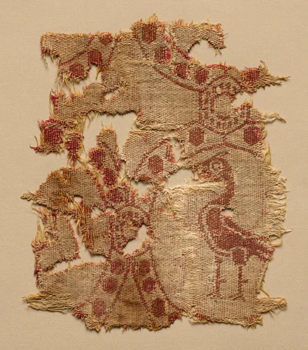 Fragment of roundels with single bird by Unknown, textile, 700-799