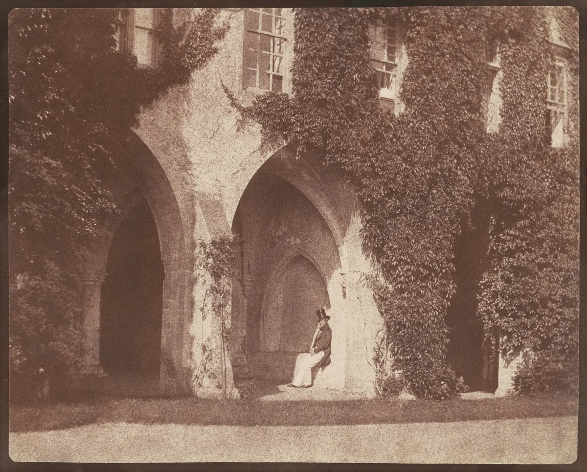 The Reverend Calvert Jones in the Cloisters at Lacock Abbey by William Henry Fox Talbot, photograph, 1845