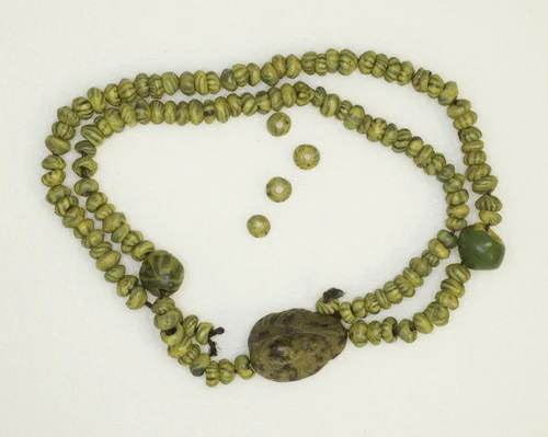 Amulet of a Duck (strung on beads) by Egyptian, metalwork, -1550