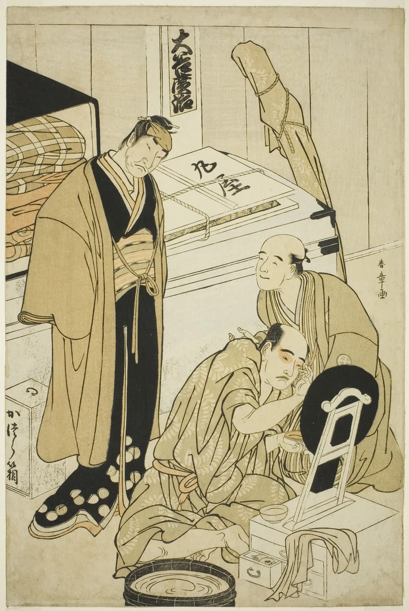 Actor Ôtani Hiroji III in His Dressing Room, Assisted by (possibly) Ôtani Tokuji I and Observed by (possibly) Nakamura Nakazô I by Katsukawa Shunshô (勝川春章), print, 1778-1788