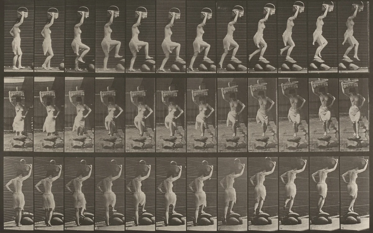 Plate Number 179. Stepping on and over a rock, a basket on head and right hand raised by Eadweard Muybridge, photograph, 1887