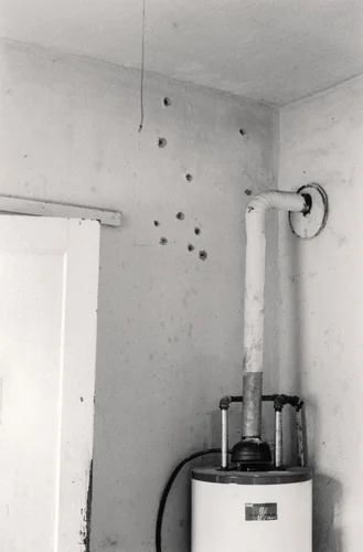 Evidence of Police Early Morning Raid, Republic of New Africa Headquarters, Jackson, Mississippi by Doris A. Derby, photograph, 1971