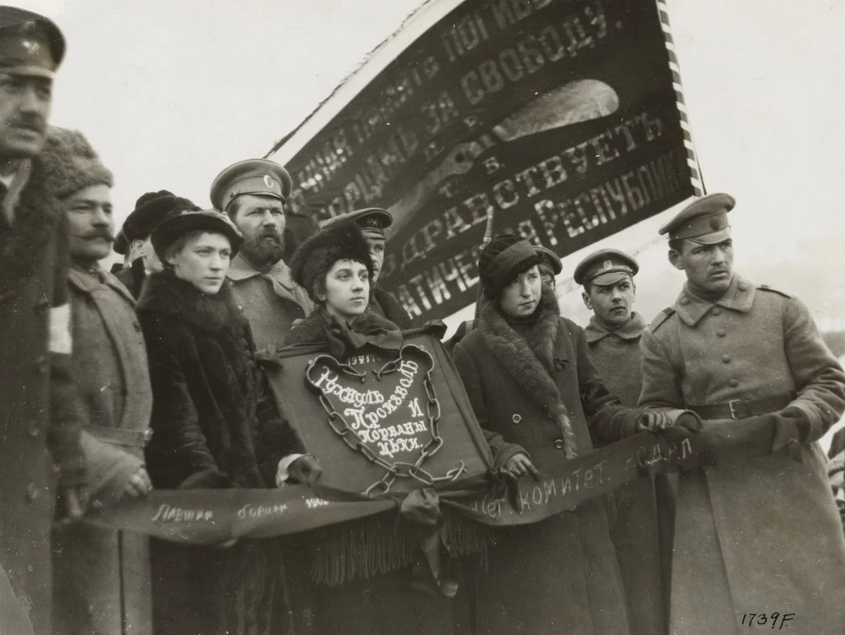 "The Chains are Broken": Young Girls Bearing in the Streets of Petrograd Sections of Chains from the Prisons of the Romanoff Regime by London Daily Mirror, photograph, 1917