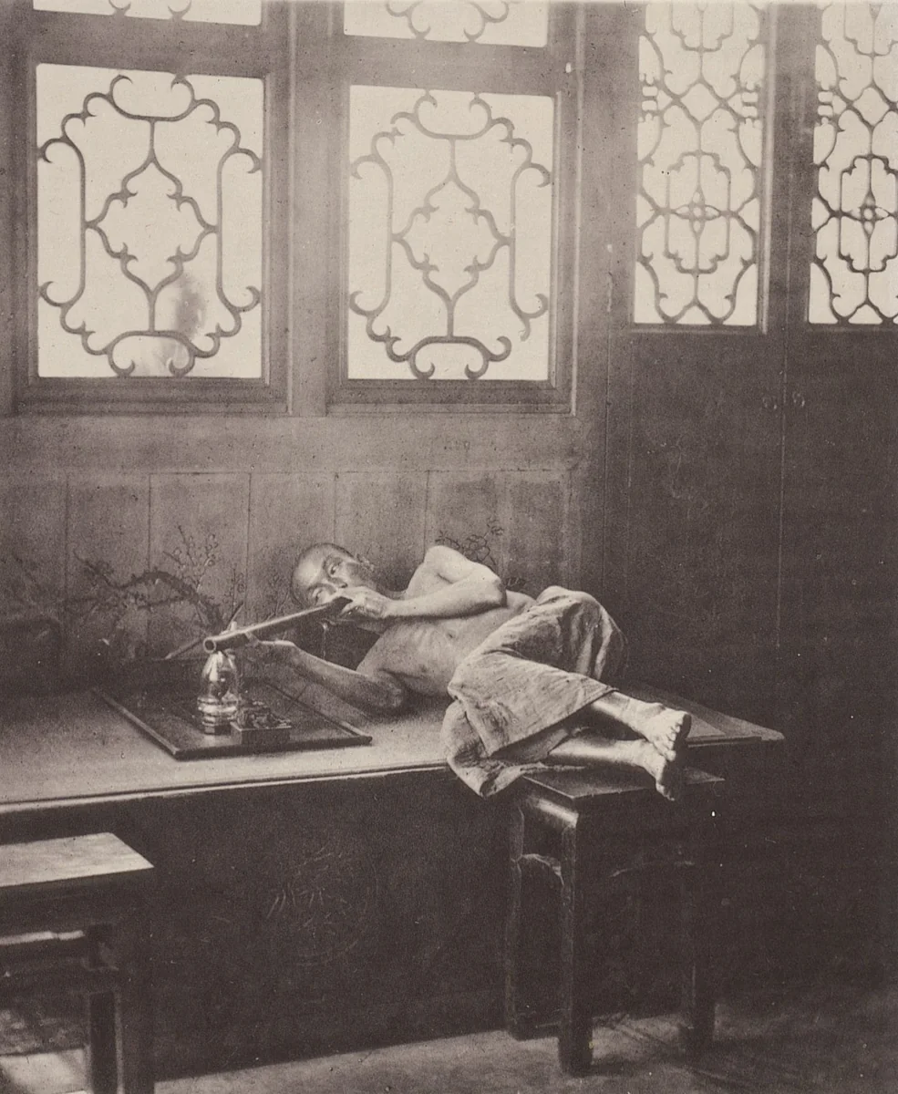 Opium-Smoking in a Restaurant by John Thomson, photograph, 1873