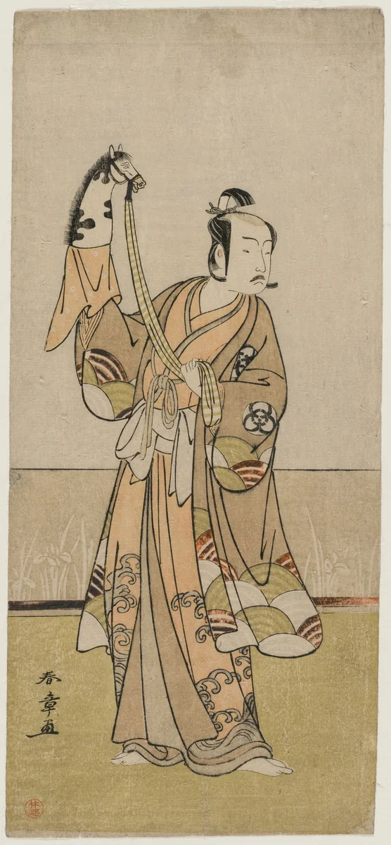 Bando Hikosaburo III Holding a Hand Pupper by Katsukawa Shunshô (勝川春章), print, 1774-1777