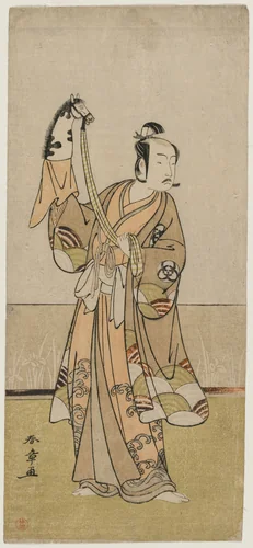 Bando Hikosaburo III Holding a Hand Pupper by Katsukawa Shunshô (勝川春章), print, 1774-1777