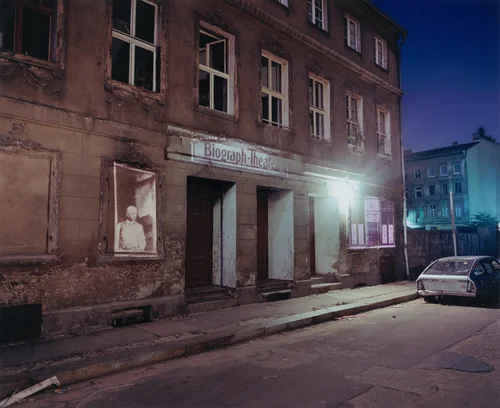 Joachimstrasse 20: Slide projections of former Jewish residents, theatre, and Torah reading room, 1929-31, Berlin by Shimon Attie, photograph, 1992