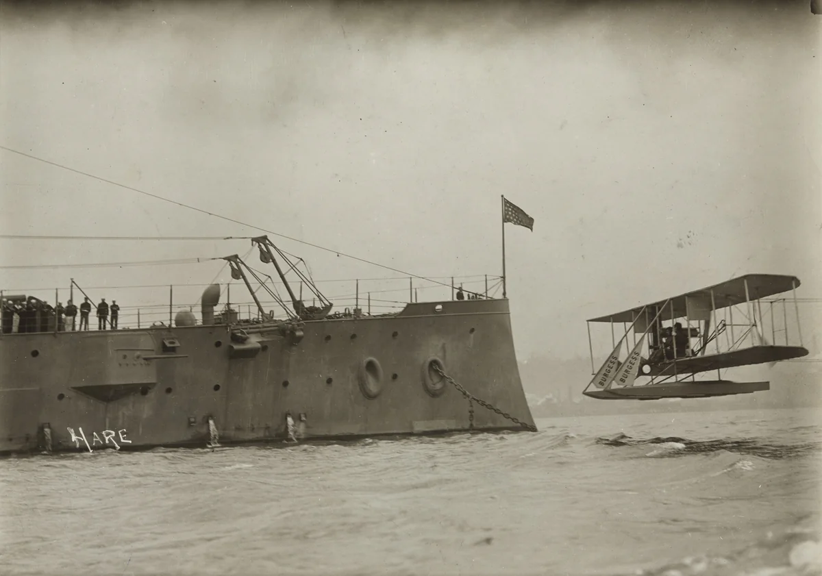 Plane Landing Alongside U.S.S. Washington by James H. Hare, photograph, 1912