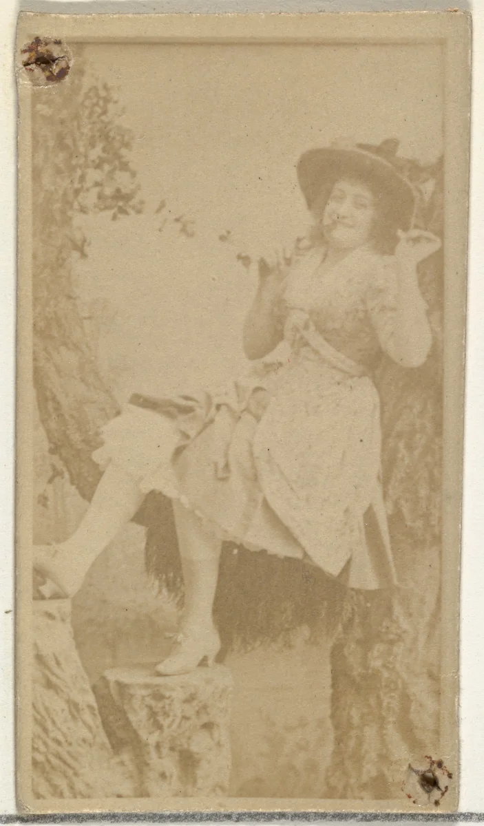 [Actress in studio reclining against prop trees], from the Actors and Actresses series (N145-8) issued by Duke Sons & Co. to promote Duke Cigarettes by W. Duke, Sons & Co., photograph, 1890-1895