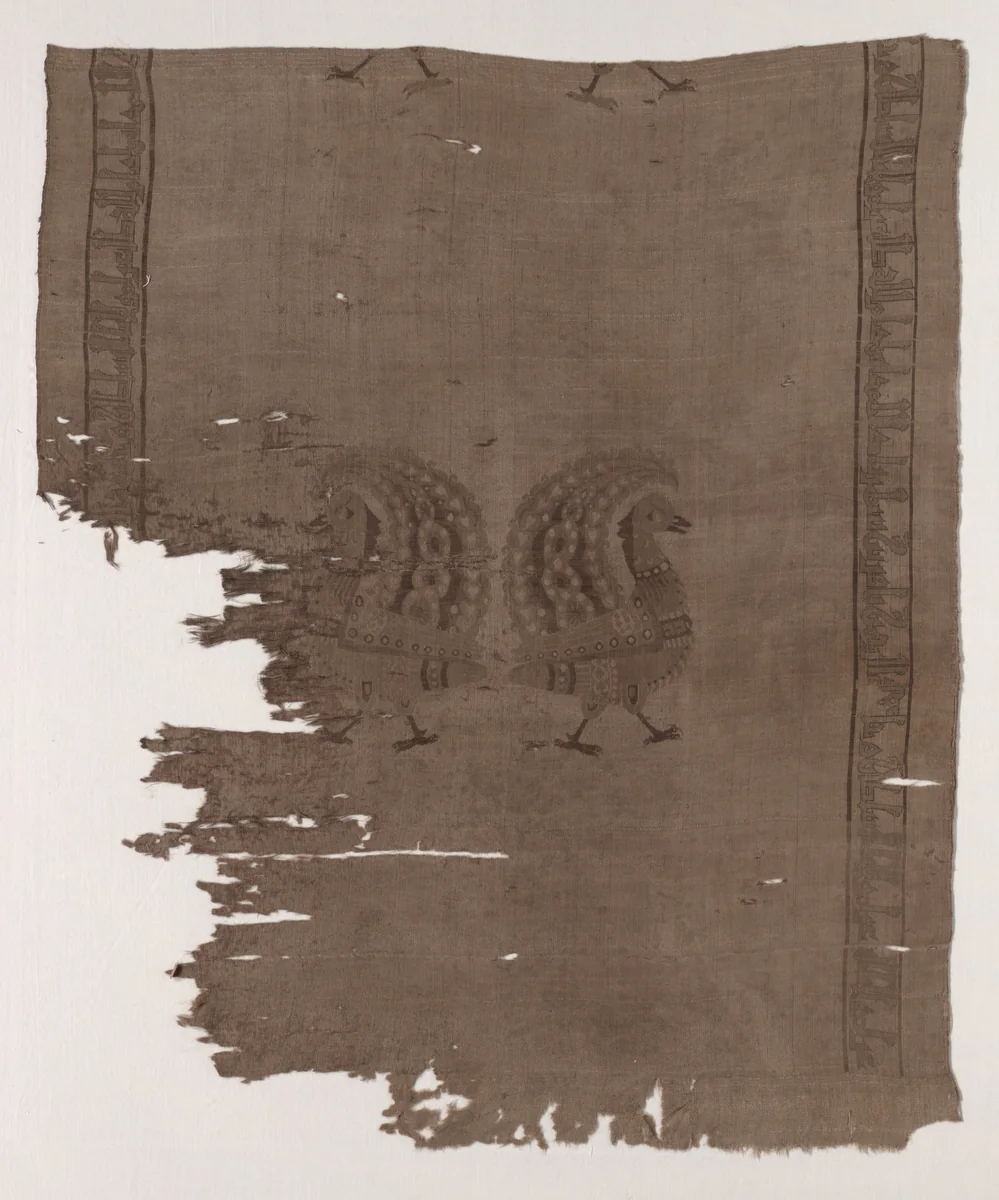 Fragments with peacocks and inscriptions by Unknown, textile, 950-1968