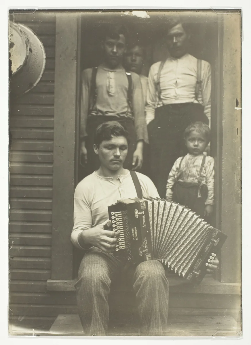 Slovak Steel Worker in the Pittsburgh Region Relaxes after Supper by Lewis Wickes Hine, photograph, 1909
