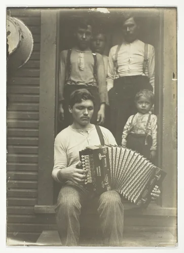 Slovak Steel Worker in the Pittsburgh Region Relaxes after Supper by Lewis Wickes Hine, photograph, 1909