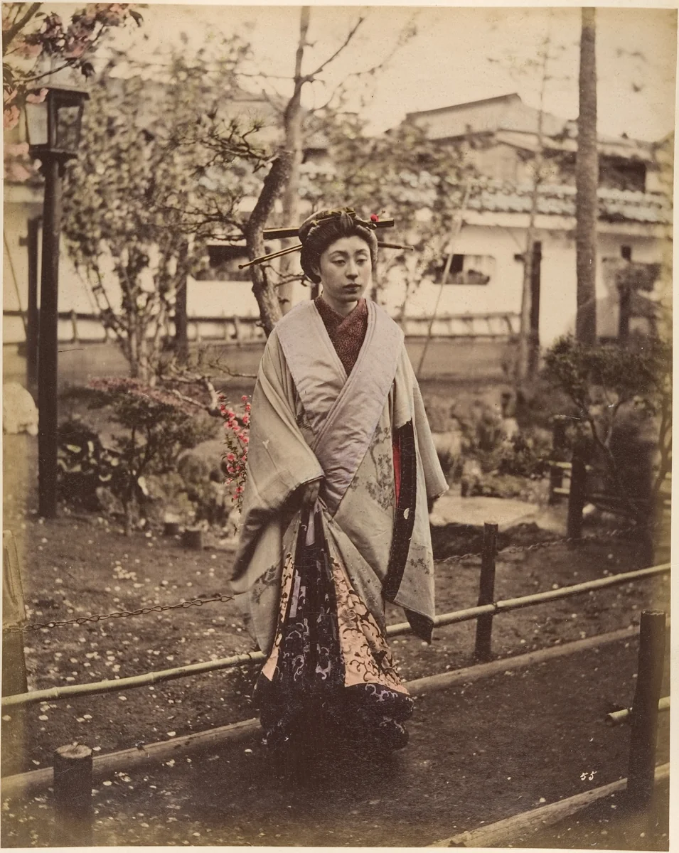 [Japanese Woman in Traditional Dress Posing Outdoors] by Suzuki Shin'ichi, photograph, 1870-1879