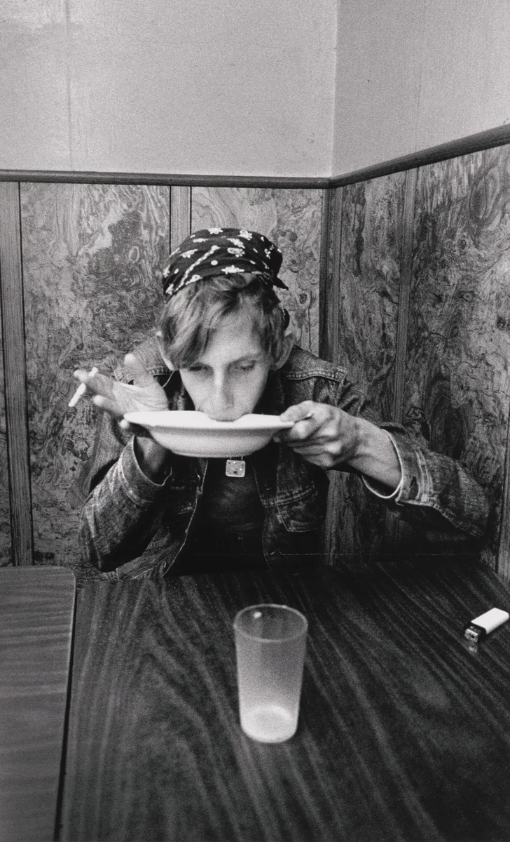 Dave Eating Oatmeal at the Economy by Jim Goldberg, photograph, 1990